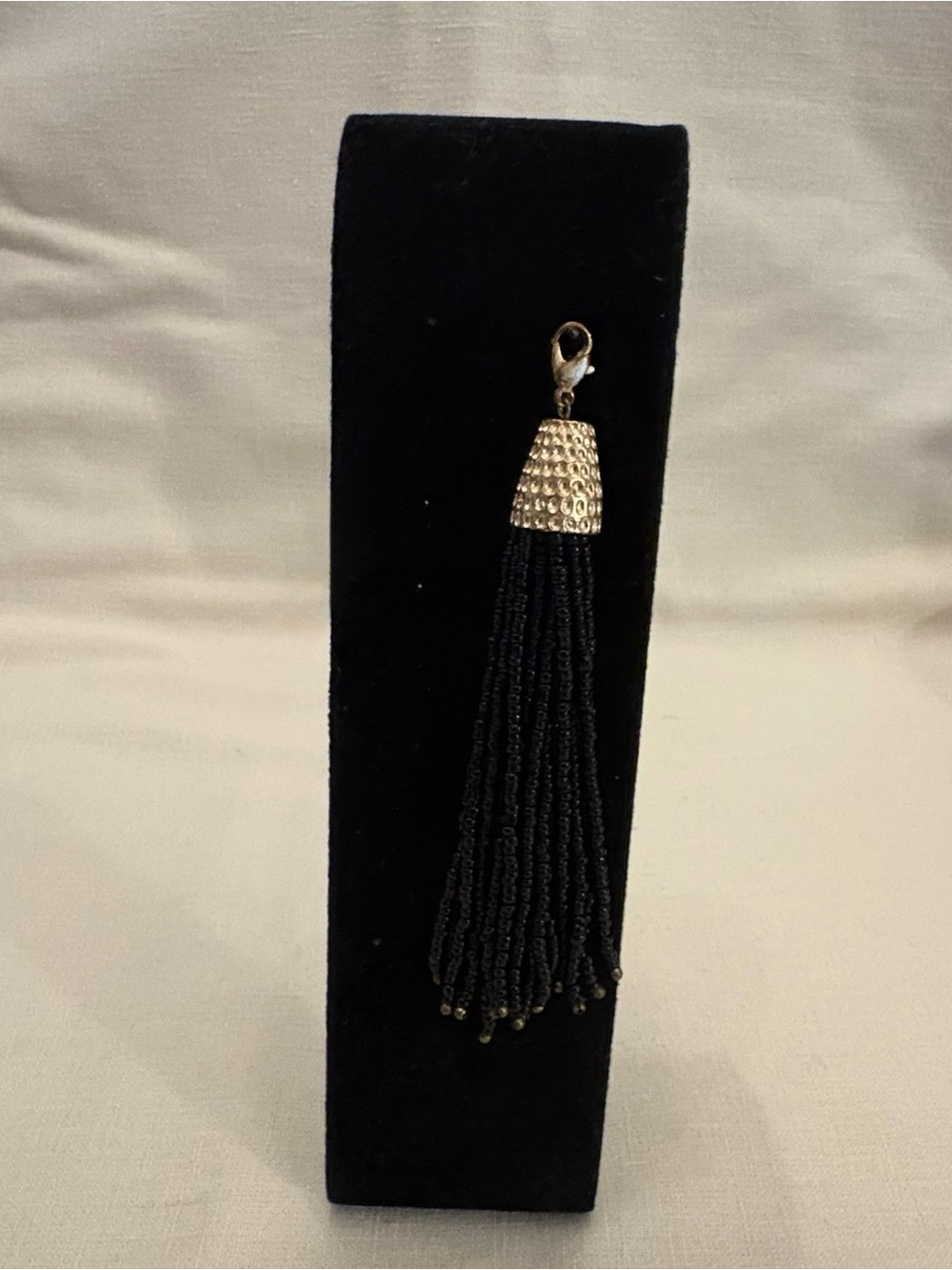 Black Beaded Tassel Pendant with Gold Cap